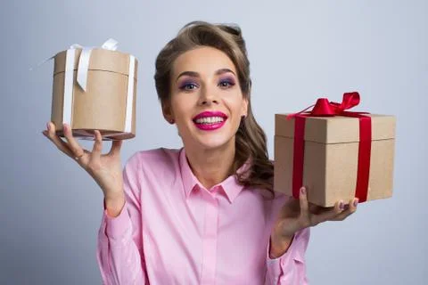 Woman with presents Stock Photos
