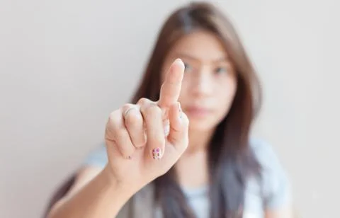 Woman pressing an imaginary button empty space Stock Photos