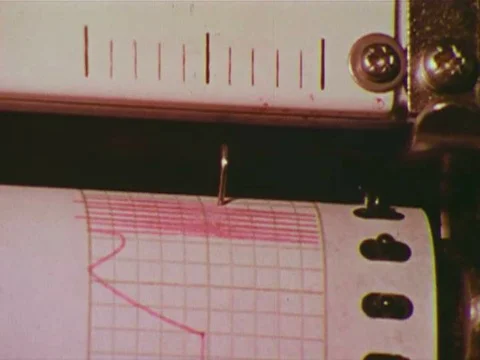 A woman processes scientific data and enters it into a computer in 1975. Stock Footage 74934416