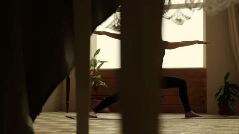 Woman professionally performs yoga elements Video stock 170746559