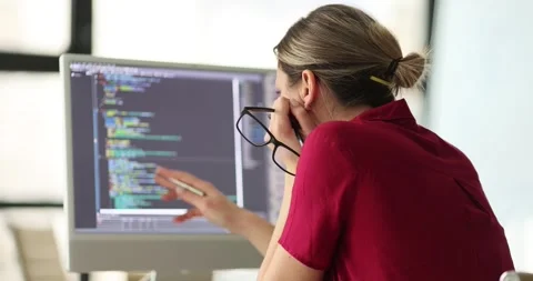 Woman programmer conducts remote self-test and IT Stock Footage 262862428