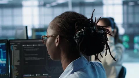 Woman programming in AI data center, close up Stock Footage 319248899