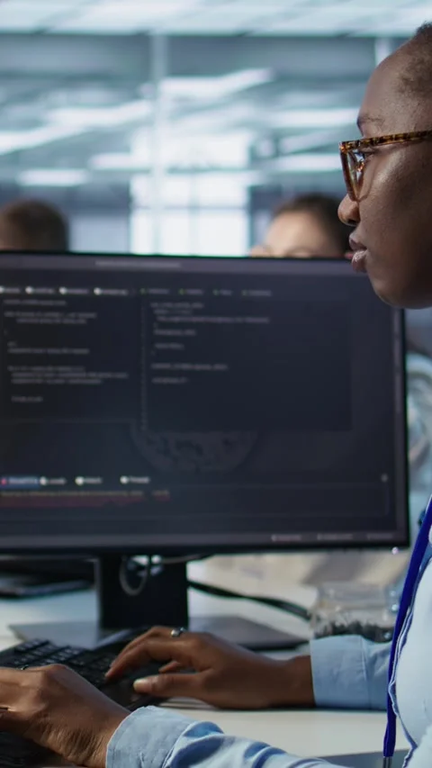 Woman programming in AI data center, close up Stock Footage 319540442