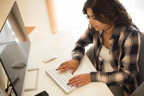 Woman programming computer Stock Photos