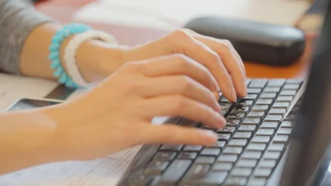 Woman is programming, woman is working on computer, female hands on keyboard 库存影片 120339636