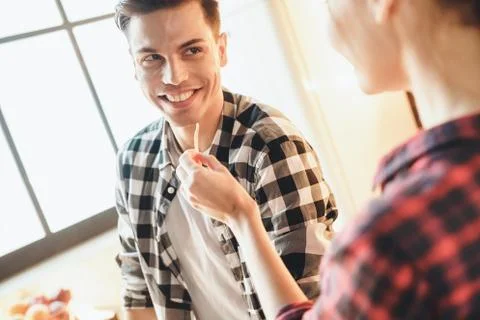 Woman propose man sliced meat Stock Photos