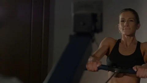 Woman pulling hard the exerciser 動画素材 73994134