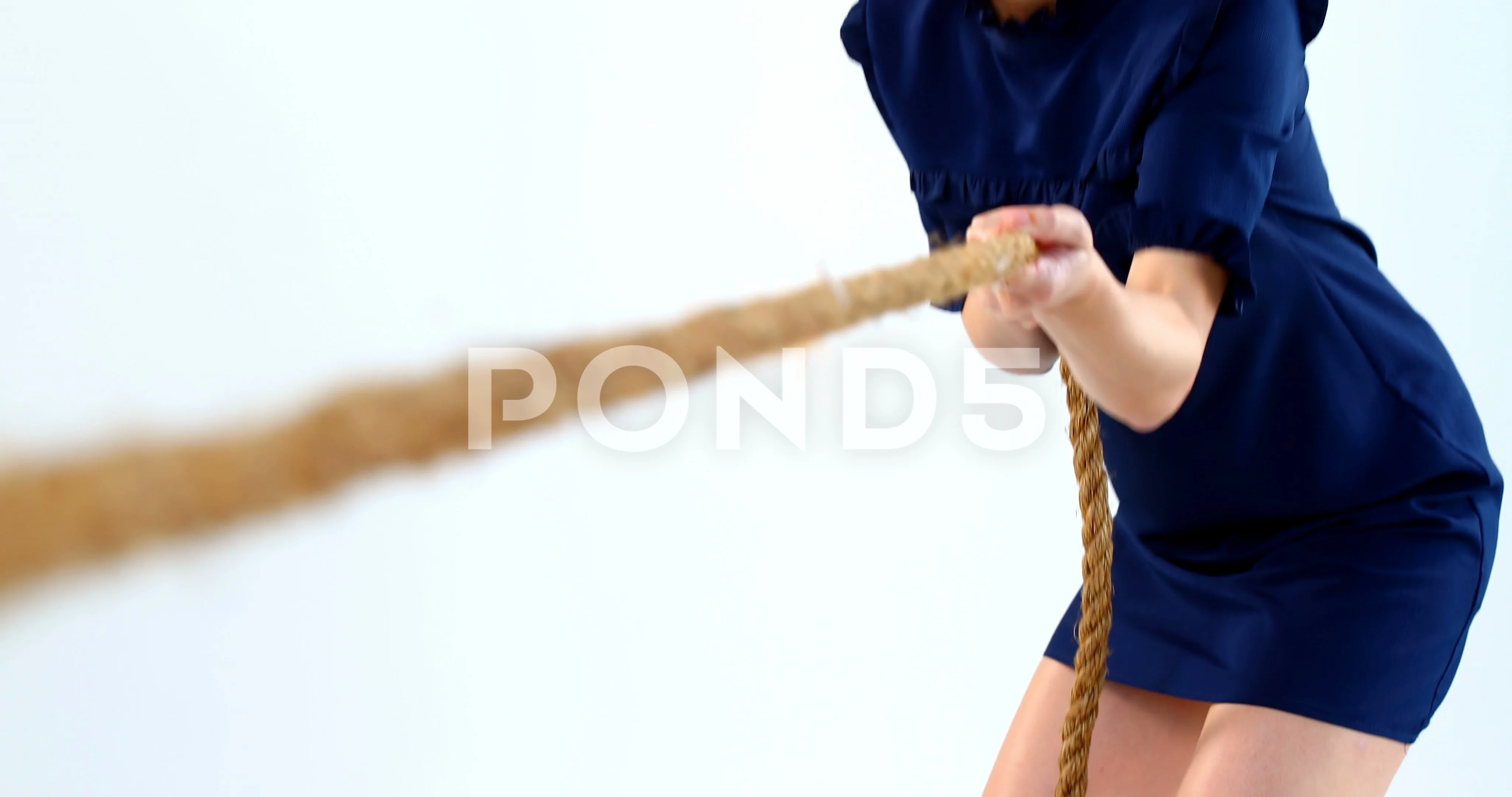 Woman pulling a rope tug of war 4k, Stock Video