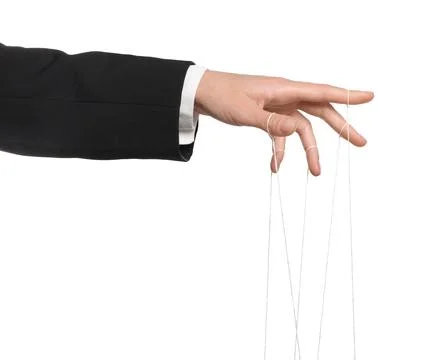 Woman pulling strings of puppet on white background, closeup Stock Photos