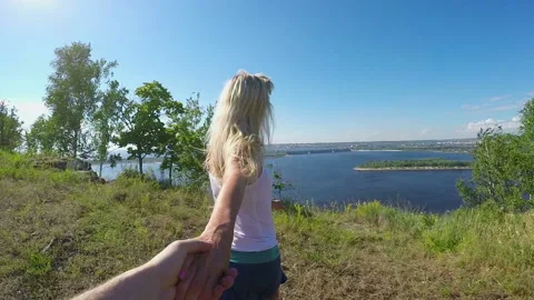 A woman pulls a man by the hand Stock-Footage 89756301