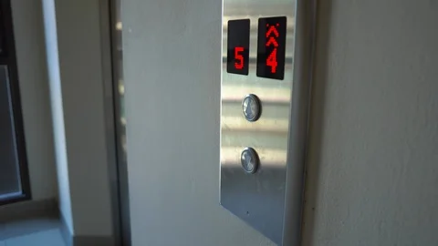 Woman push the button to call an elevator Stock Footage 88281788