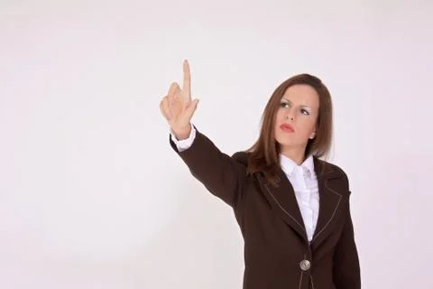 Woman pushing the button Stock Photos