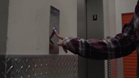 Woman Pushing Elevator Button Stock Footage 329591585