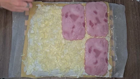 Woman Puts Ham On Cheese While Making Roll. Video stock 220727756