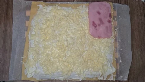 Woman Puts Ham On Cheese While Making Roll. Video stock 220727767