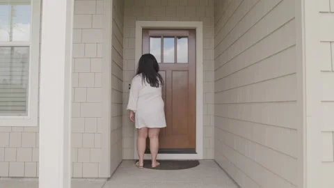 Woman Puts in Key Code at Her Front Door and Walks Inside Stock-Footage 208758906