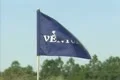 Woman putting ball into golf course hole Footage