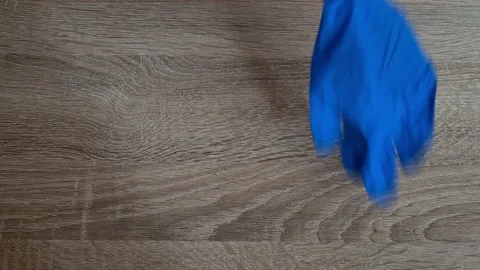 Woman Putting Gloves on table 스톡 동영상 152094561