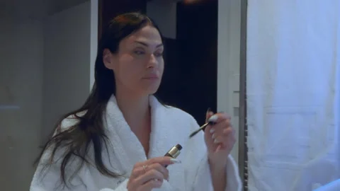 Woman Putting On Makeup Stock Footage 239236401