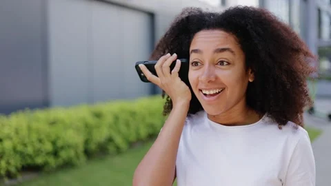 Woman putting speaker to ear while Stock Video Pond5