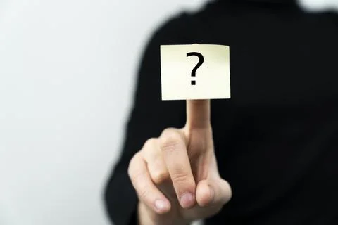 A woman with a "question mark" sticker. question mark Stock Photos
