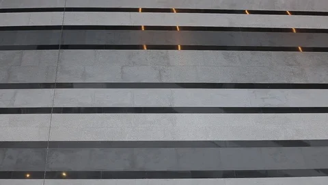 The woman quickly walks through the empty hall Stock Footage 87027301