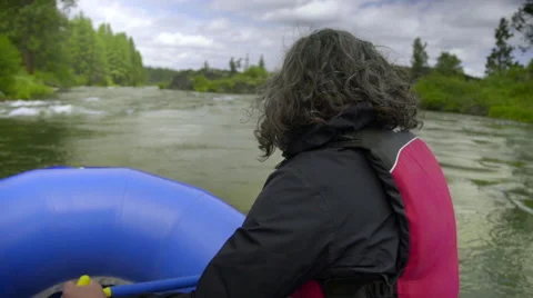 Woman on raft smiles Stock Footage 59708178