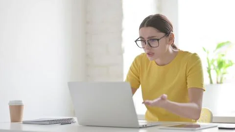Woman Reacting to Loss While using Laptop Stock Photos