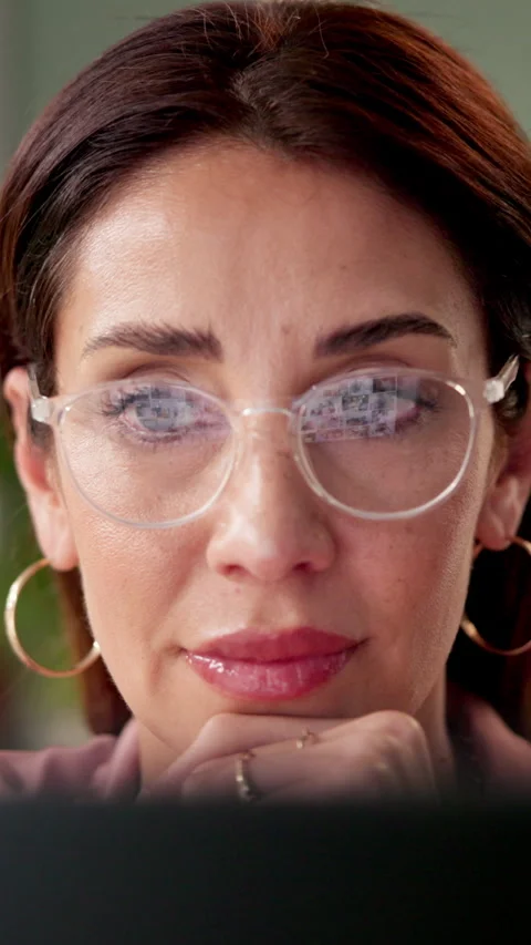 Woman, reading and computer with reflection, glasses and thinking with review Stock Footage 290058484
