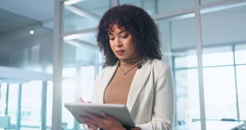 Woman, reading and thinking with tablet in office, publicist or planning for Stock Footage 342032866