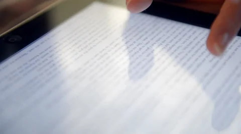 Woman reading bible on tablet computer Stock Footage 42114078