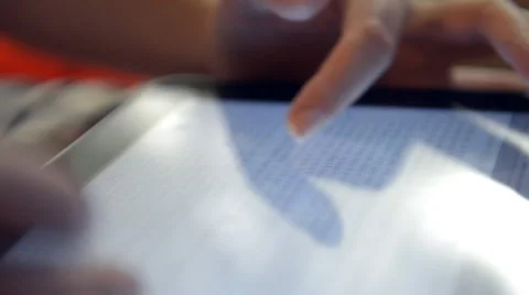 Woman reading bible on tablet computer Stock Footage 42114280