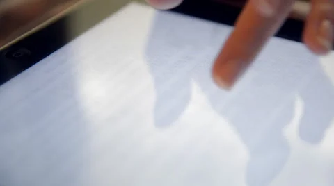 Woman reading bible on tablet computer Stock Footage 42114526
