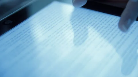 Woman reading bible on tablet computer Stock Footage 51837490