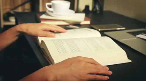 Woman reading book Stock Footage 64778997