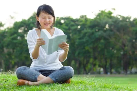 Woman reading book Stock Photos