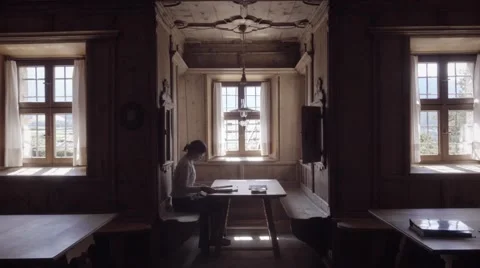 Woman reading in empty library Stock Footage 55141914