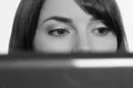 Woman reading laptop. Stop motion. SD. Footage