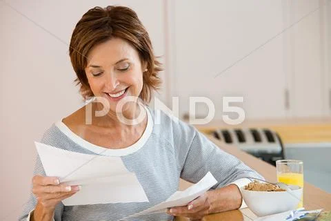 A Woman Reading A Letter