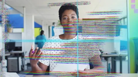 Woman reading notes, looking up in office, explaining and gesturing while HUD Stock Footage 335316600