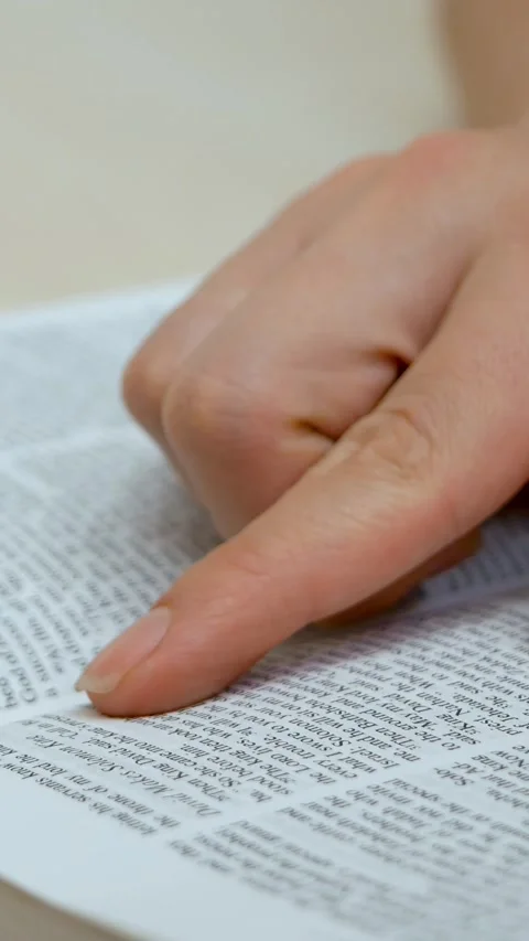 Woman reads holy scripture attentively Video stock 316560153