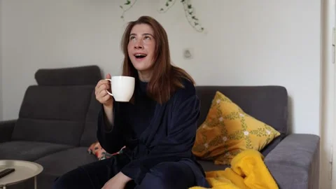Woman realizes her automatic coffee habit Video stock 341233073