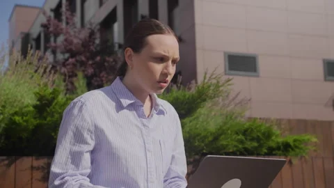 Woman Receive Bad News Using Laptop Outdoors Stock Footage 278676953
