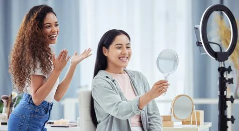 Woman recording a makeup tutorial with a client for her beauty blog or vlog 스톡 사진