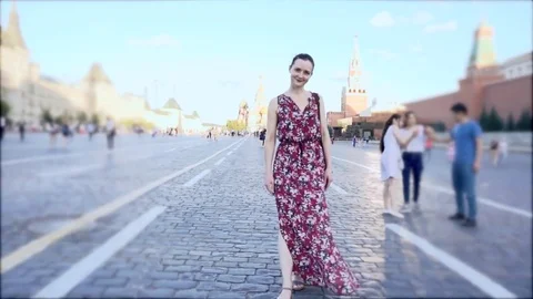 Woman on the red square Stock Footage 79170097