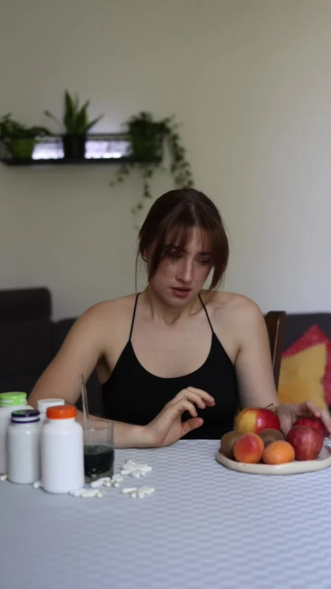 Woman refuses another serving of a trendy health supplement Stock-Footage 339096069