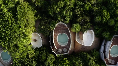 Woman relaxes in rooftop pool while on vacation 스톡 동영상 138668751