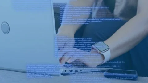 Woman responding to code overlay appearing over hands, moving to keyboard and Stock-Footage 335283109