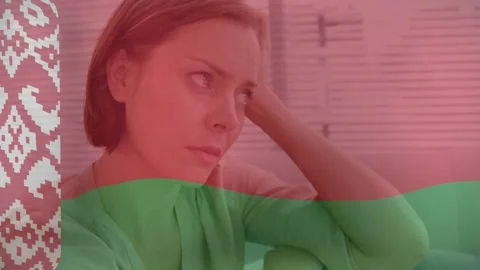 Woman resting hand as frames advancing, gazing right, overlay crossing sofa, Stock Footage 329505192