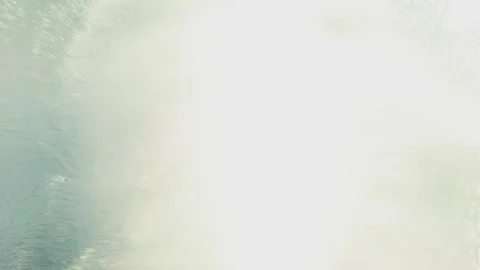 A woman rinses a car at a car wash with strong water pressure. View from inside Stock Footage 241843962